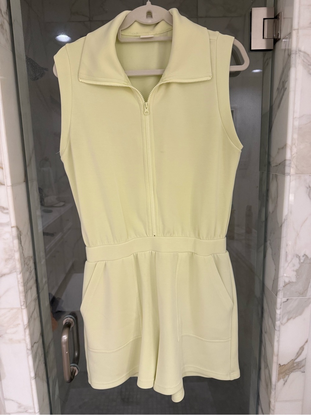 Women’s butter yellow Sleeveless Zip-Front Romper in Light Yellow